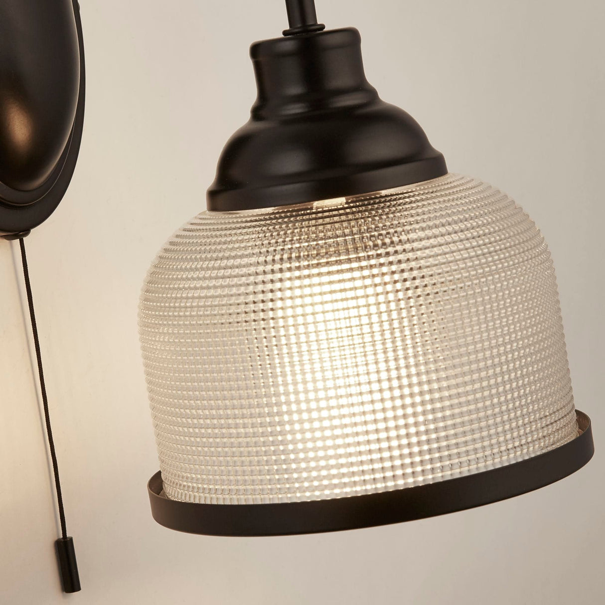 Highworth Wall Light- Matt Black Metal,Holophane Style Glass - Comet Lighting