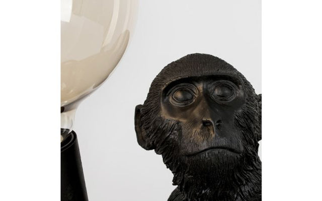 Monkey Holding a Light Bulb Table Lamp Black