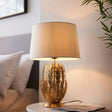 Delphine Table Lamp Gold Leaf w/ Ivory Shade - Comet Lighting