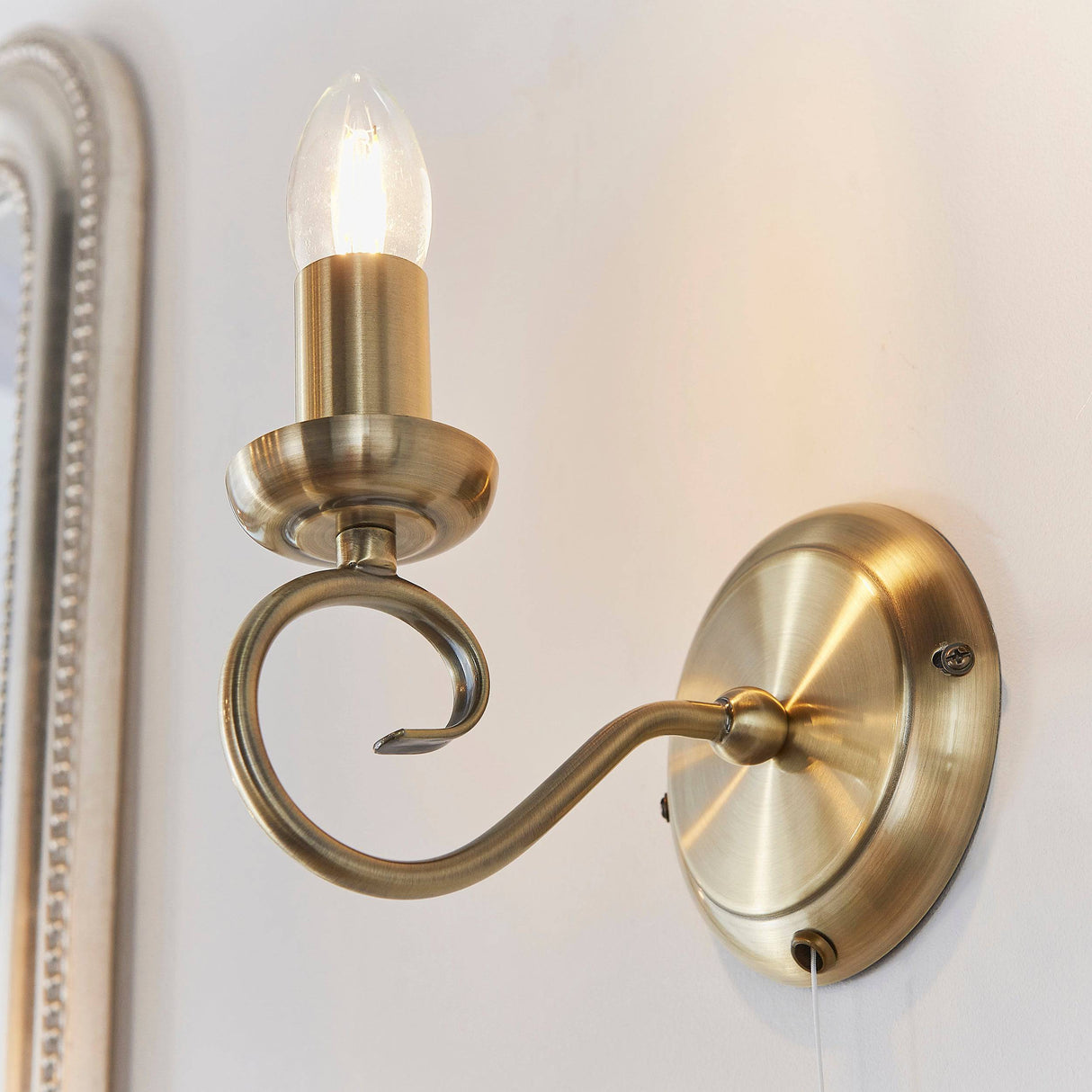 Trafford 1-Light Wall Light Antique Brass - Comet Lighting