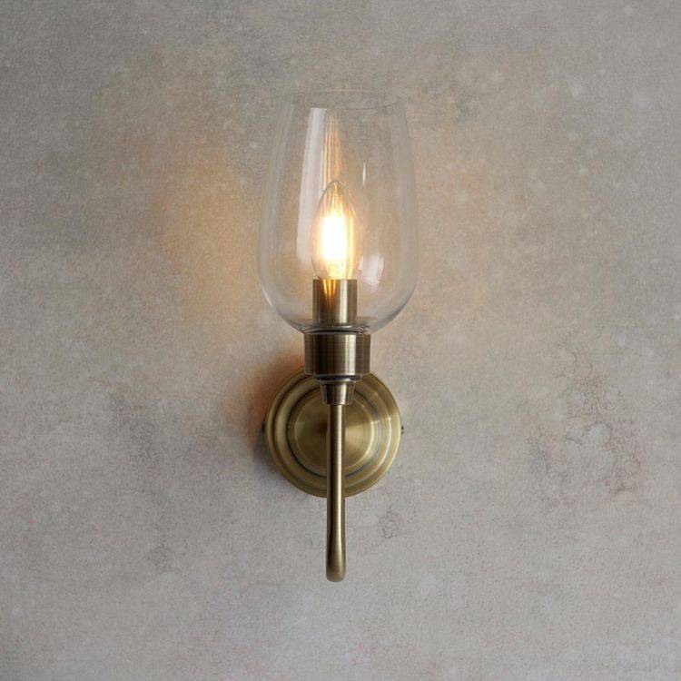 Acheron Wall Light Antique Brass w/ Clear Glass - Comet Lighting