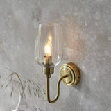 Acheron Wall Light Antique Brass w/ Clear Glass - Comet Lighting