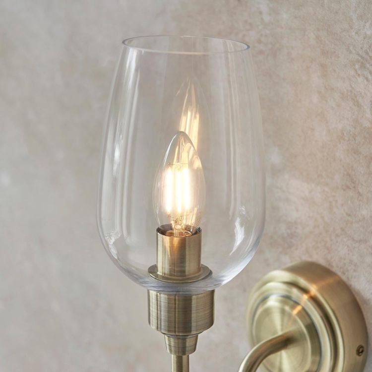 Acheron Wall Light Antique Brass w/ Clear Glass - Comet Lighting