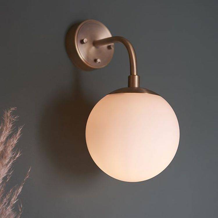 Amur Wall Light Matt Antique Brass Plate & Opal Glass - Comet Lighting