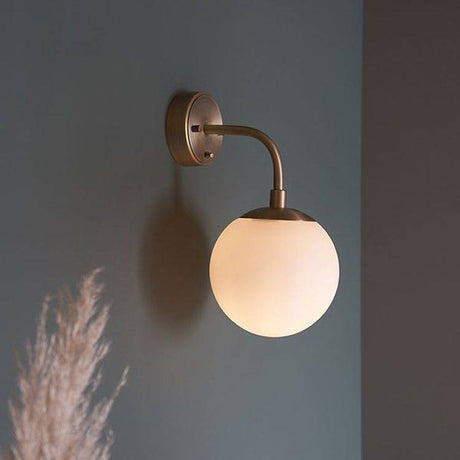 Amur Wall Light Matt Antique Brass Plate & Opal Glass - Comet Lighting