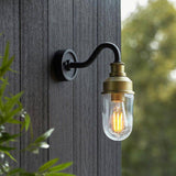 Mano Curved Arm Exterior Wall Light Matt Antique Brass - Comet Lighting