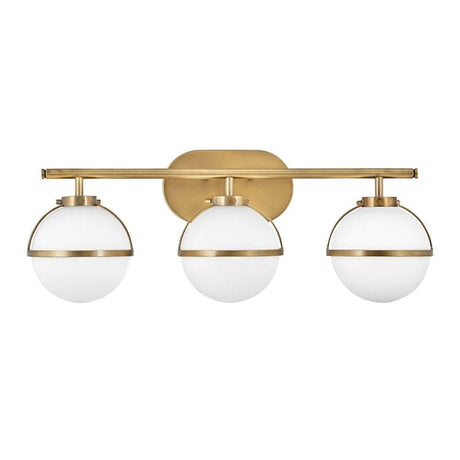 Hollis 3 Light Wall Light Opal Glass Heritage Brass - Comet Lighting