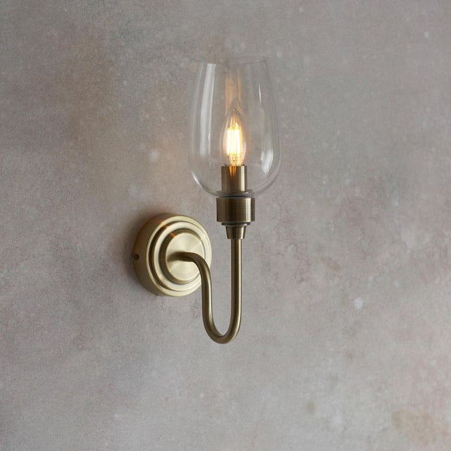Acheron Wall Light Antique Brass w/ Clear Glass