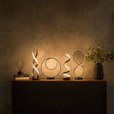 Infinity LED Loop Touch Table Lamp In Matte Black - Comet Lighting