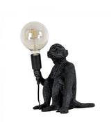 Monkey Holding a Light Bulb Table Lamp Black - Comet Lighting