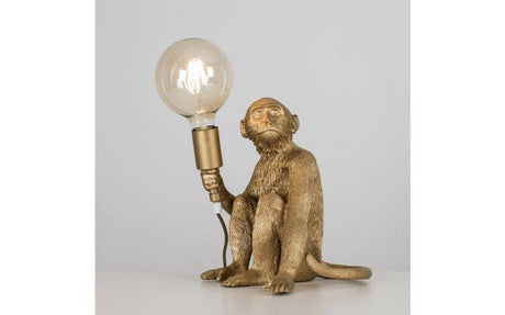 Monkey Holding a Light Bulb Table Lamp Metallic Gold - Comet Lighting