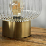 Patterson Matt Gold Table Lamp With Clear Glass Globe Shade - Comet Lighting