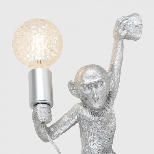Monkey Holding A Light Bulb Wall Light In Silver