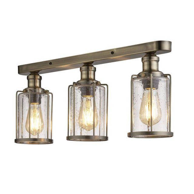 Searchlight Pipes 3Lt Flush Antique Brass With Seeded Glass - Comet Lighting